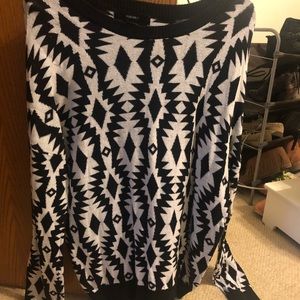 Black and white patterned sweater.